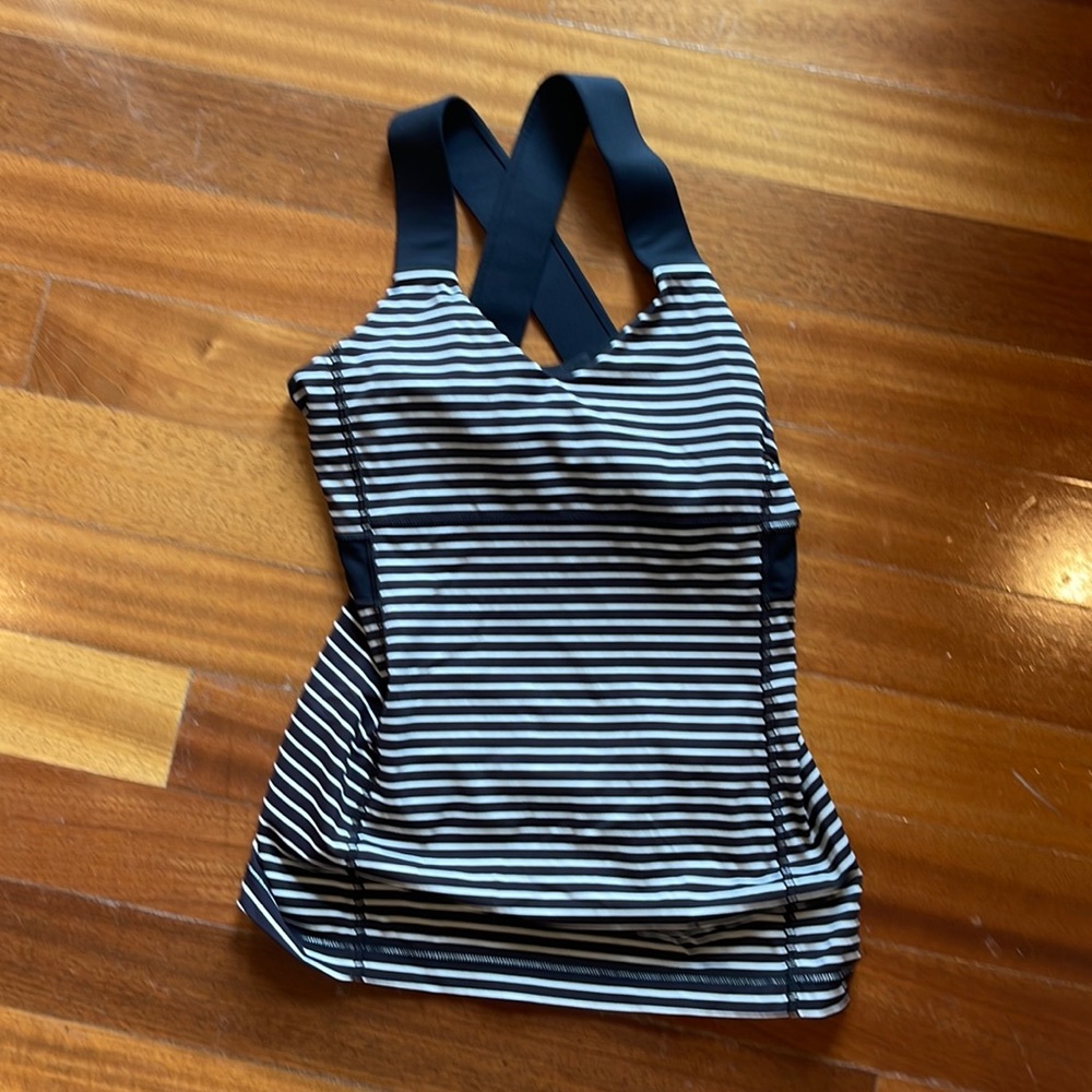 Lulu lemon lightly worn black and white striped tank top built in bra. Size 6